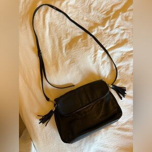 BP Black Crossbody Bag with Tassel Accents